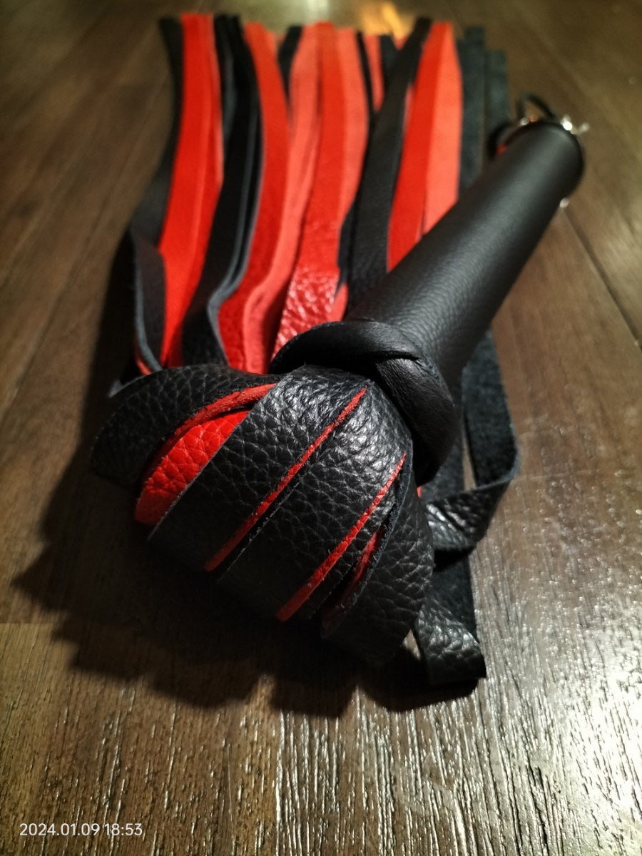 Black/red leather flogger with black leather handle
