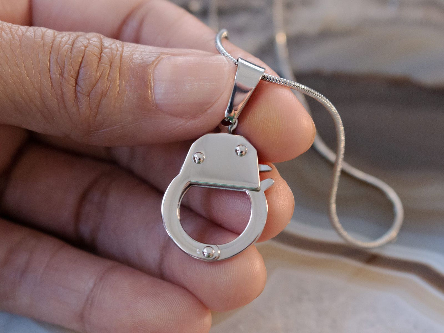 Stainless steel BDSM handcuff pendant