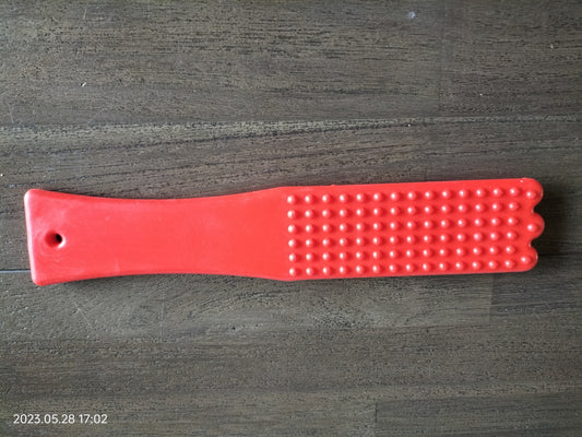 Red silicone slapper with studs