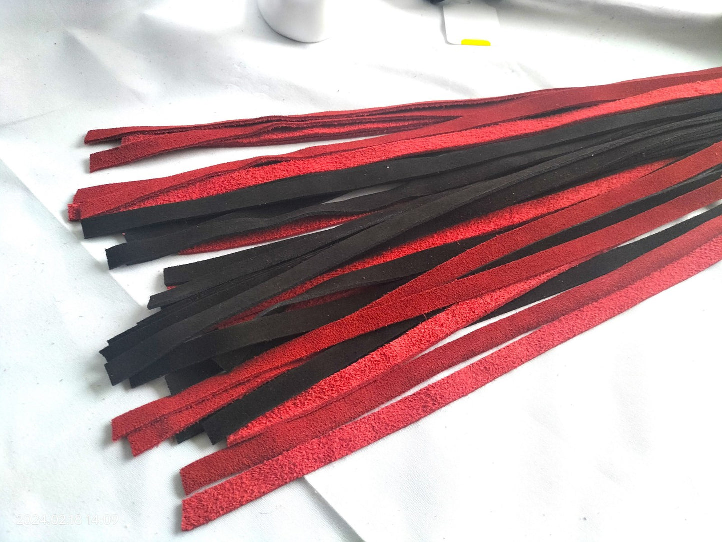 Black/red suede flogger