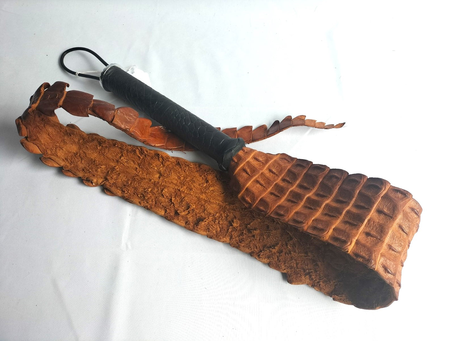 Backstrap whip cognac with crocodile print black leather handle