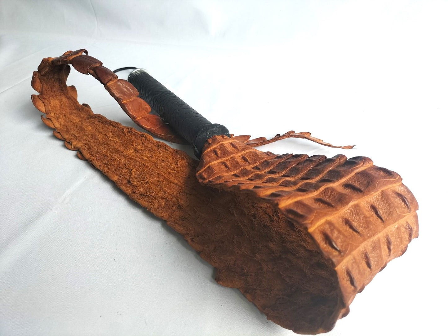 Backstrap whip cognac with crocodile print black leather handle