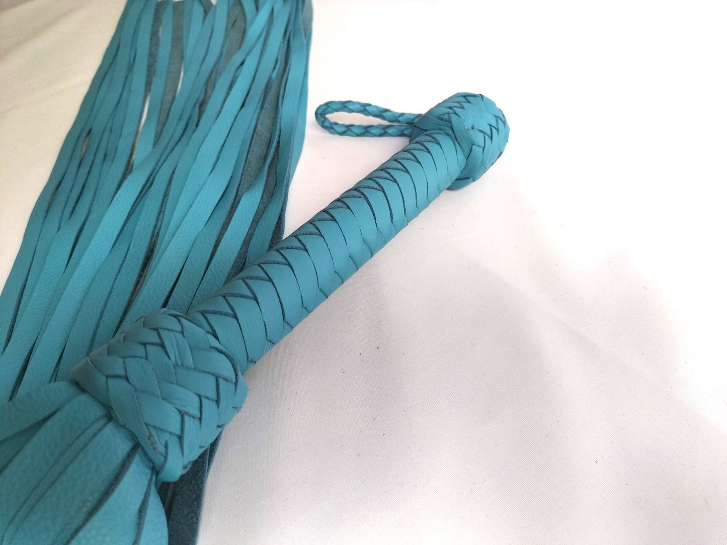 Turquoise soft warming flogger