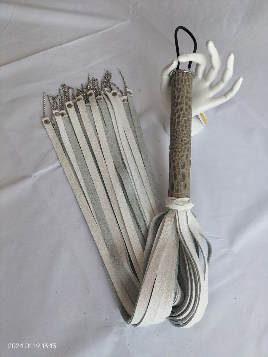 White leather flogger with chainball chain and special handle