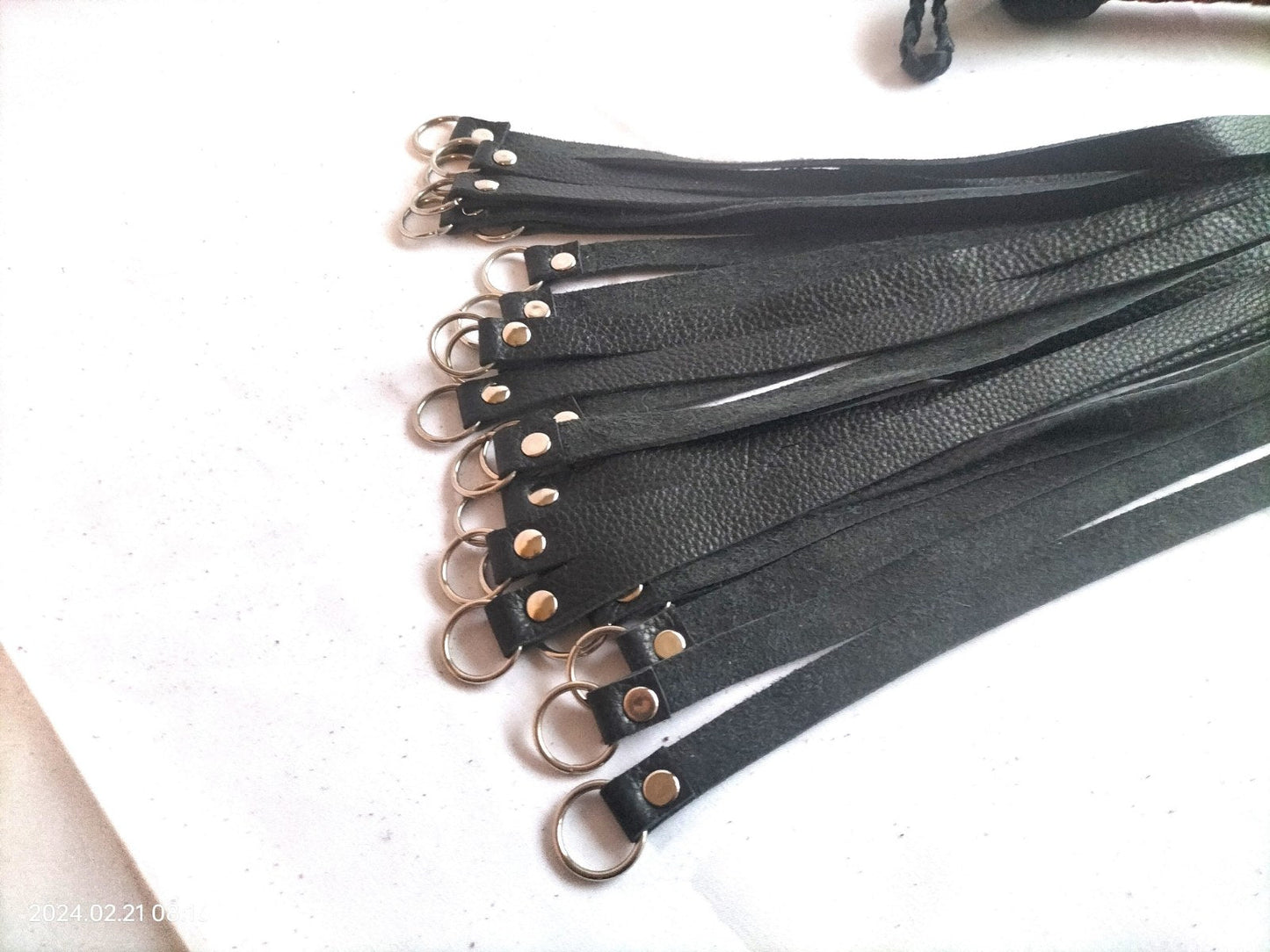 Flogger met metalen ringen (langere versie) - SM - speeltjes