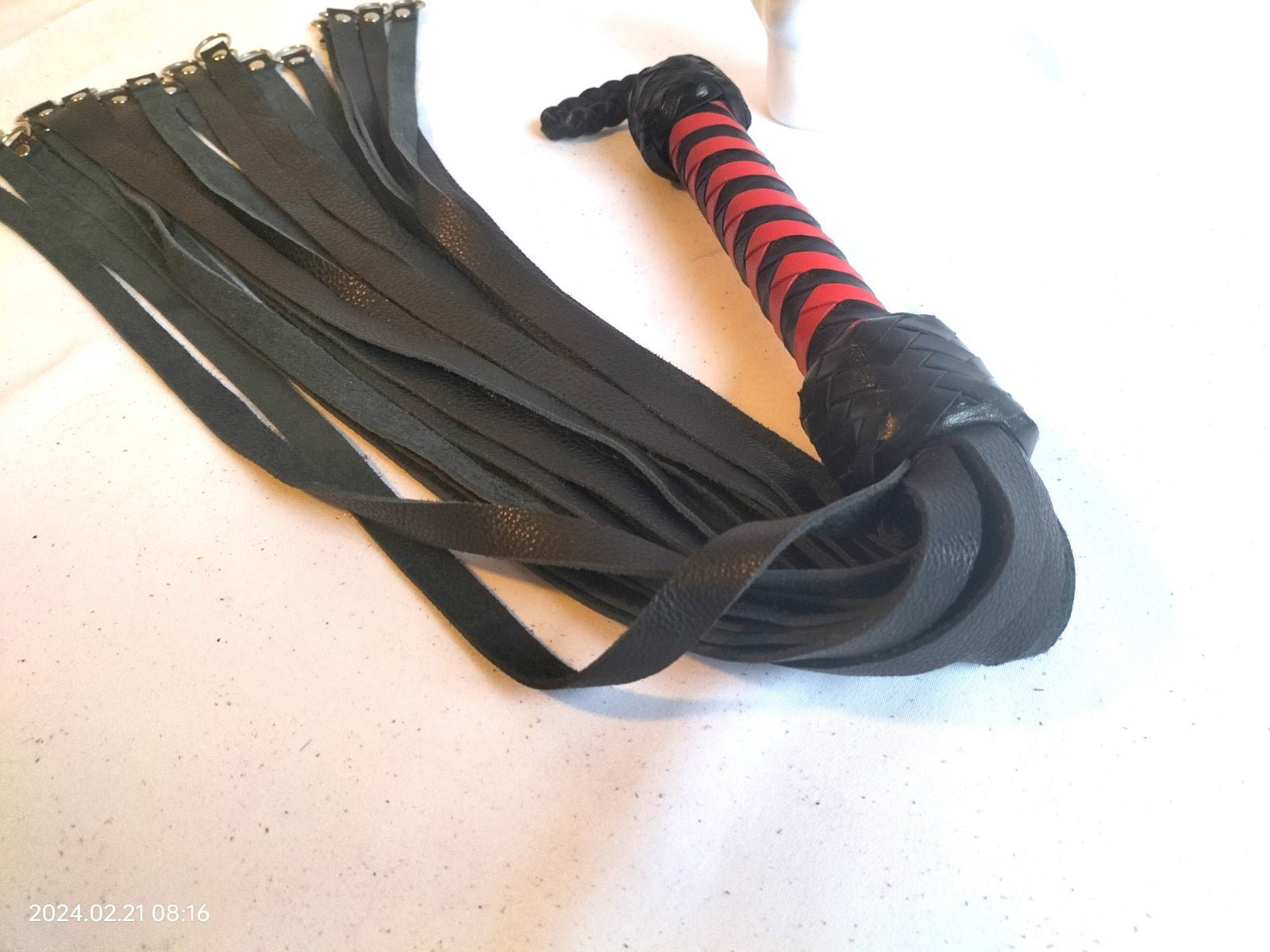 Flogger met metalen ringen (langere versie) - SM - speeltjes