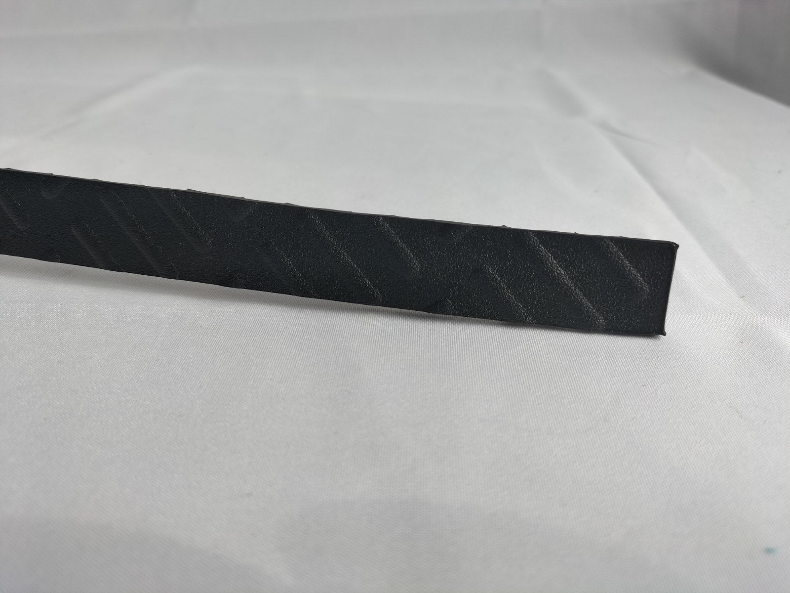 PVC slapper met reliëf (smal) - SM - speeltjes