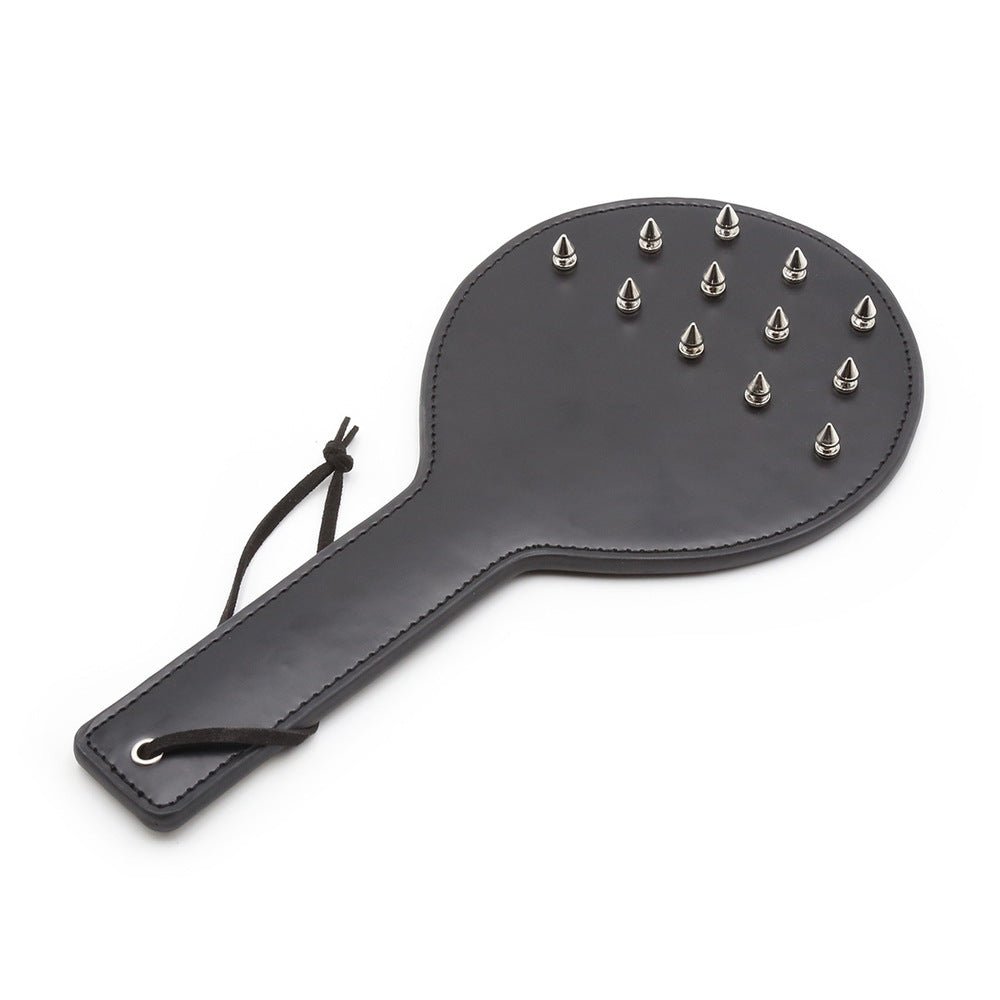 met-deze-scratch-play-paddle-kan-je-zowel-scratch-play-doen-als-dat-je-er-mee-kan-slaan-hij-is-voorzien-van-12-puntige-spikes-die-desgewenst-diep-je-huid-in-kunnen-dringen-5