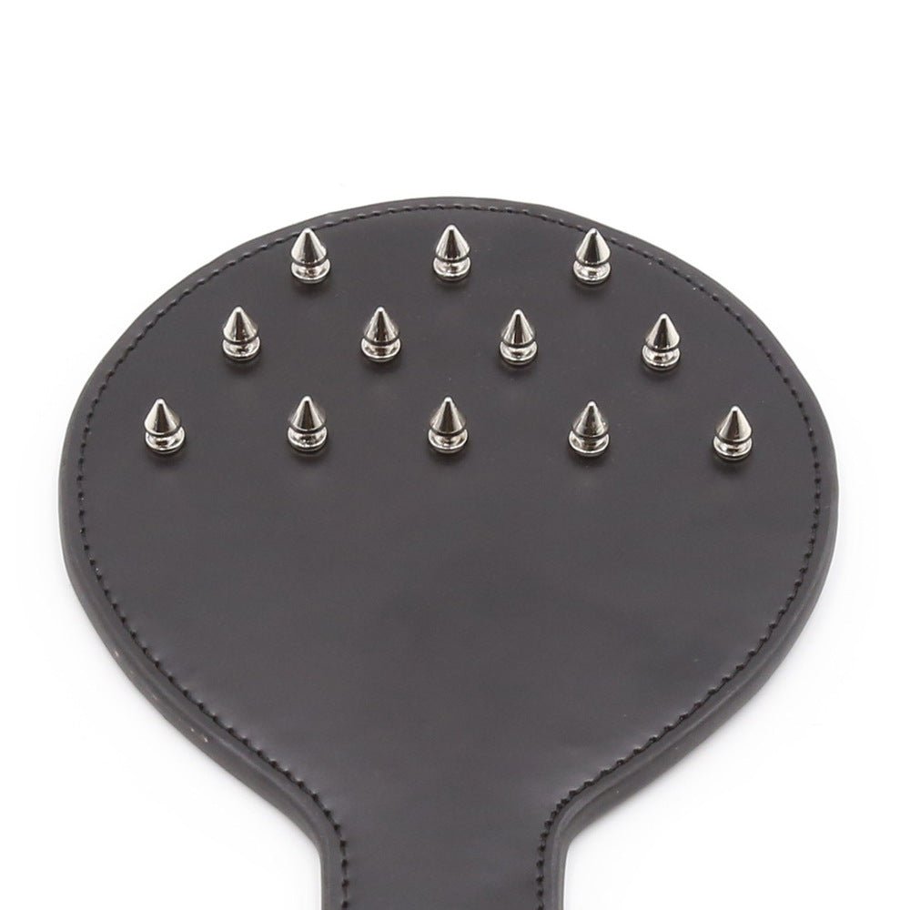 met-deze-scratch-play-paddle-kan-je-zowel-scratch-play-doen-als-dat-je-er-mee-kan-slaan-hij-is-voorzien-van-12-puntige-spikes-die-desgewenst-diep-je-huid-in-kunnen-dringen-1