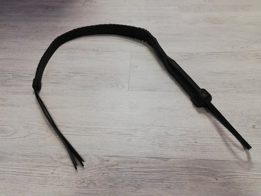 Black whip with notches
