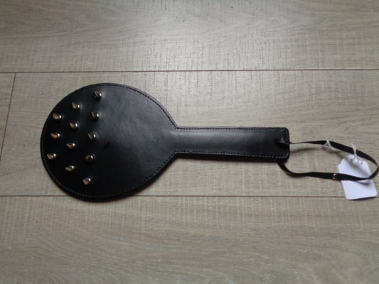 Paddle with spikes