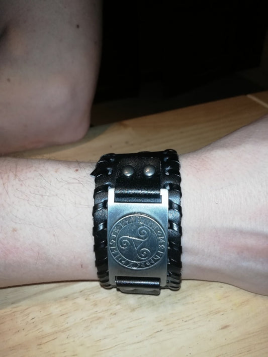 Black leather bracelet with silver colored BDSM logo