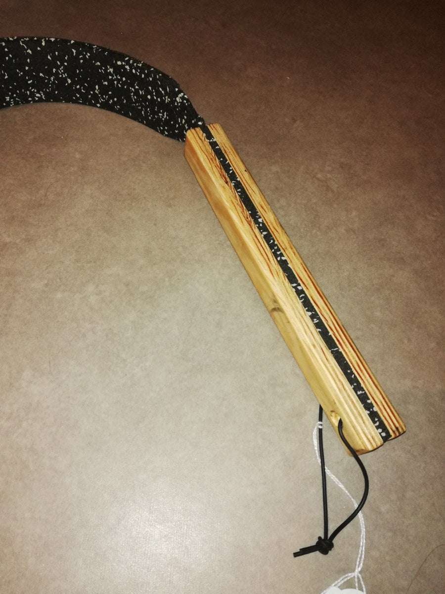 Rubber slapper with wooden handle