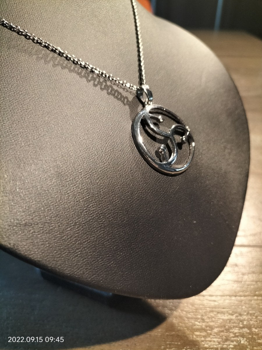 Necklace with open BDSM logo