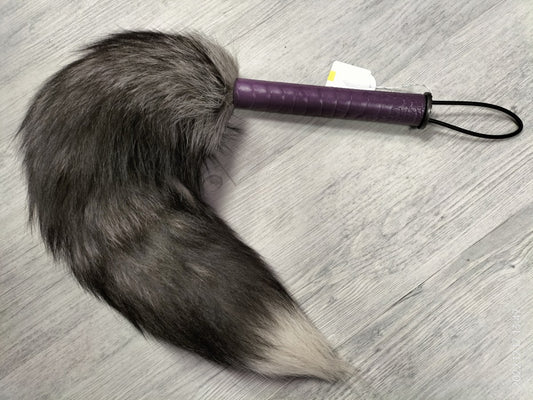 Silver fox tail with purple ostrich paw handle