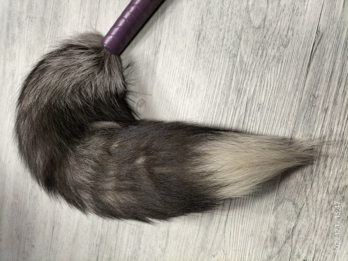 Silver fox tail with purple ostrich paw handle