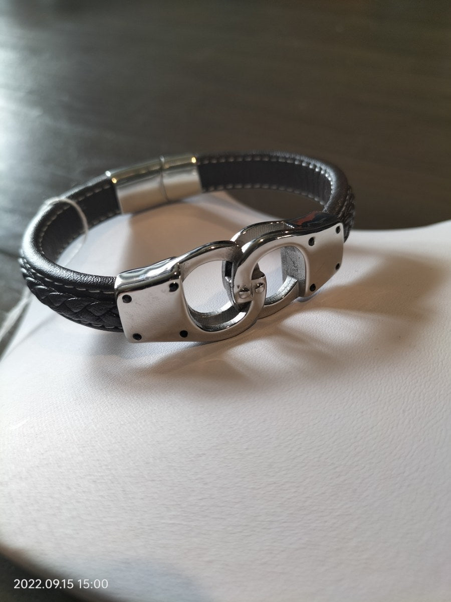 Bruin lederen heren armband met stiksel en zilver handboeien 23,5 cm - SM - speeltjes