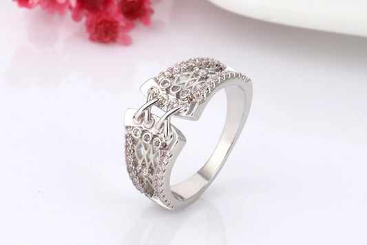 Korset ring zilverkleurig (diverse maten) - SM - speeltjes