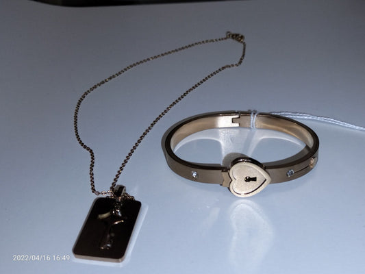 Owned en slaved armband + ketting rosé kleurig - SM - speeltjes