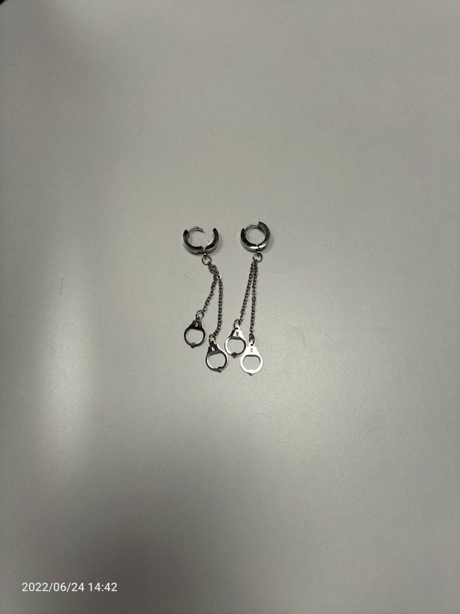 RVS oorbellen ketting en handboeien zilverkleurig - SM - speeltjes