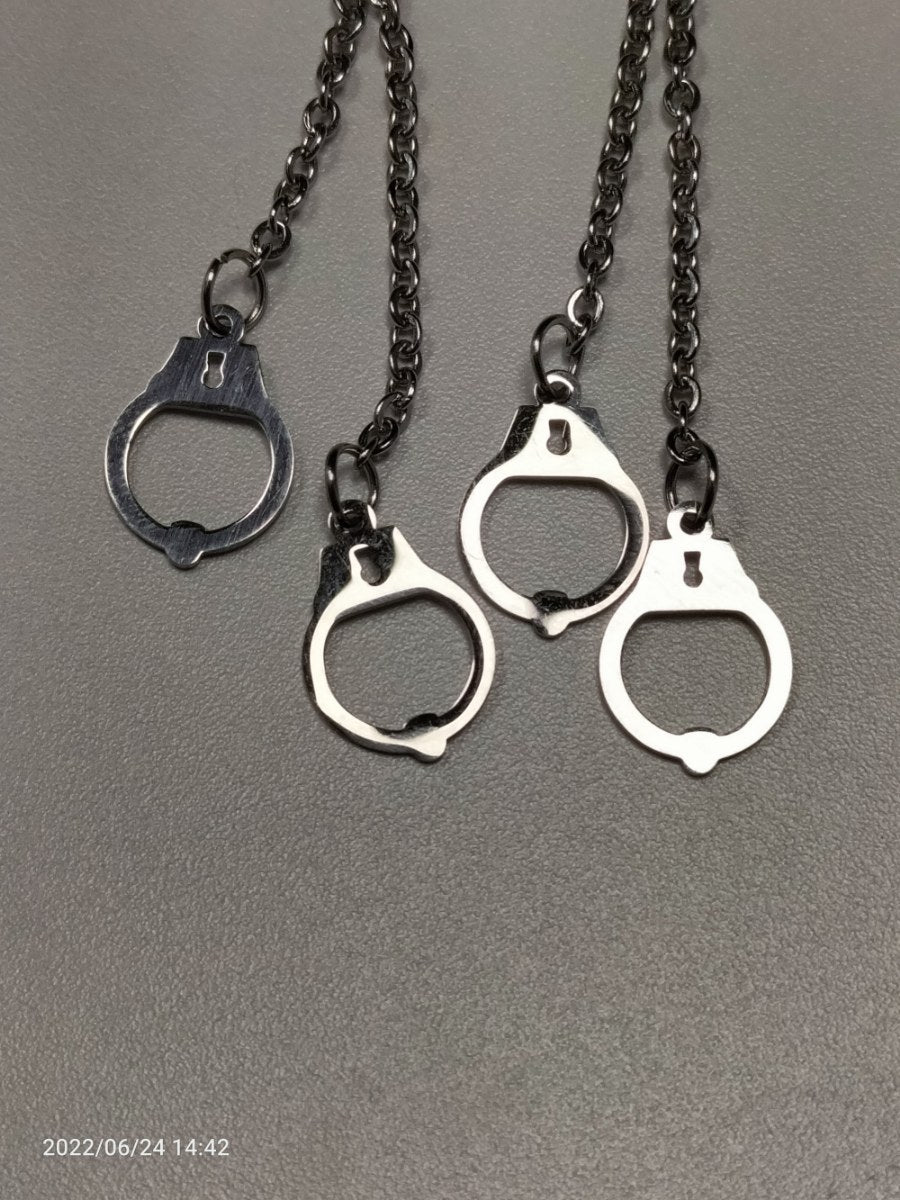 RVS oorbellen ketting en handboeien zilverkleurig - SM - speeltjes
