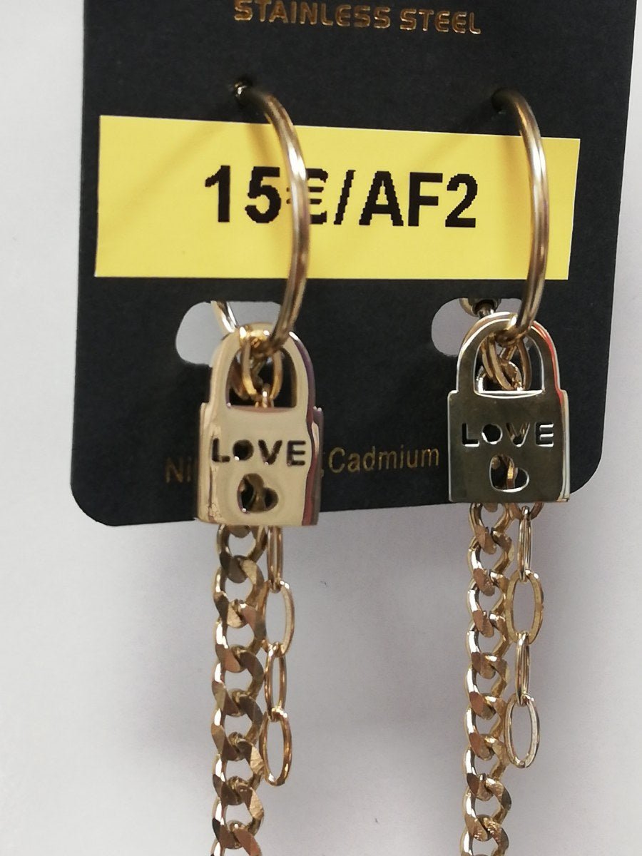 RVS oorbellen slotje met ketting goudkleurig - SM - speeltjes