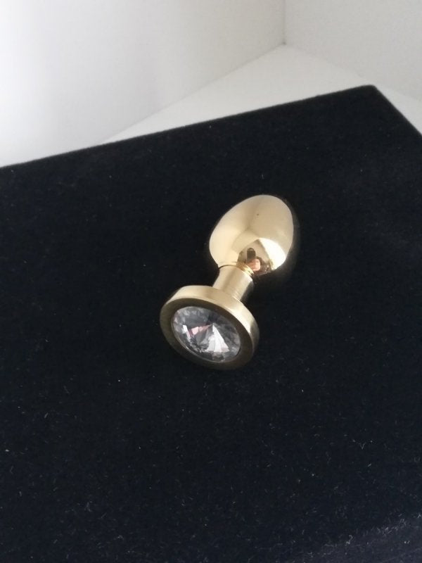 Gold colored Butt plug